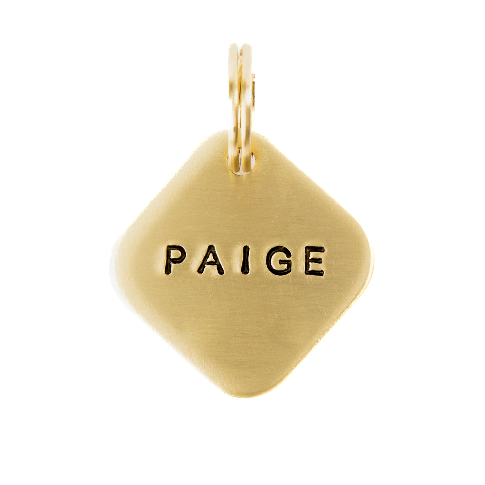 Diamond shaped dog ID tag on white background.