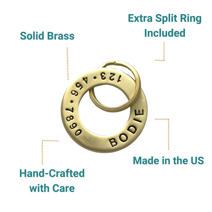 Gold ring charm with engraved numbers and 'BODIE' text, labeled with features on a white background.