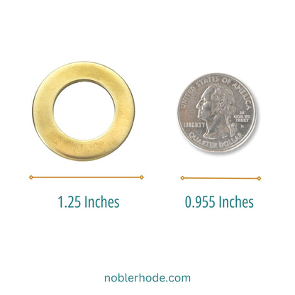 Gold washer next to a quarter coin for size comparison on noblerhode.com